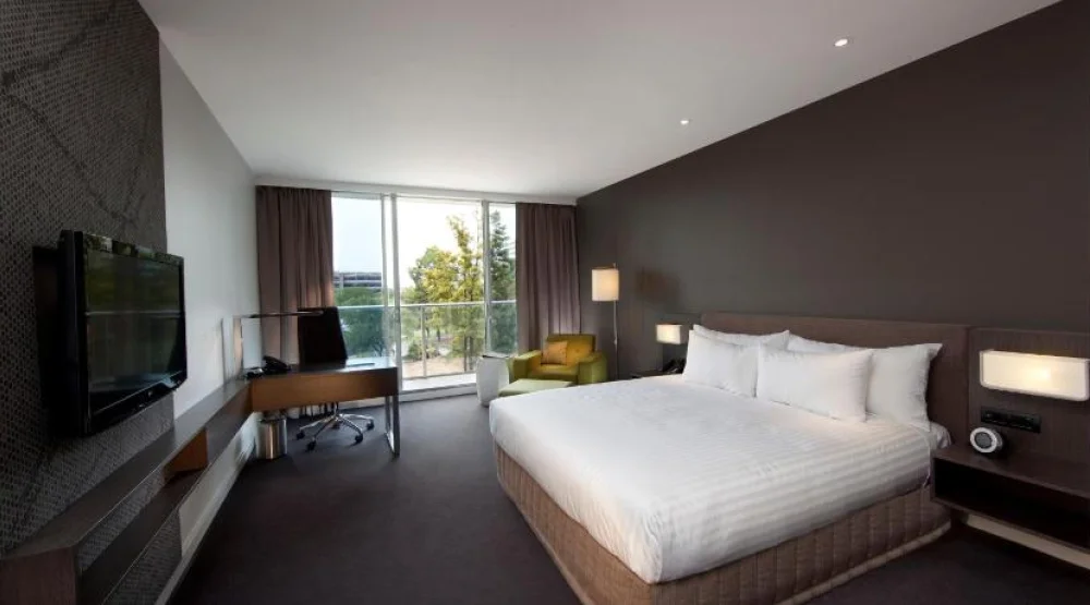 Deluxe Executive Room with One King Bed, Balcony and Lounge Access at Pullman Adelaide
