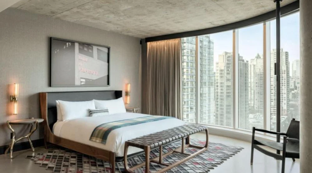 The Den, Two Bedroom Bi-level Suite, Bedroom 1: One King, Bedroom 2: One King, High Floor, Fireplace at The Douglas Autograph Collection