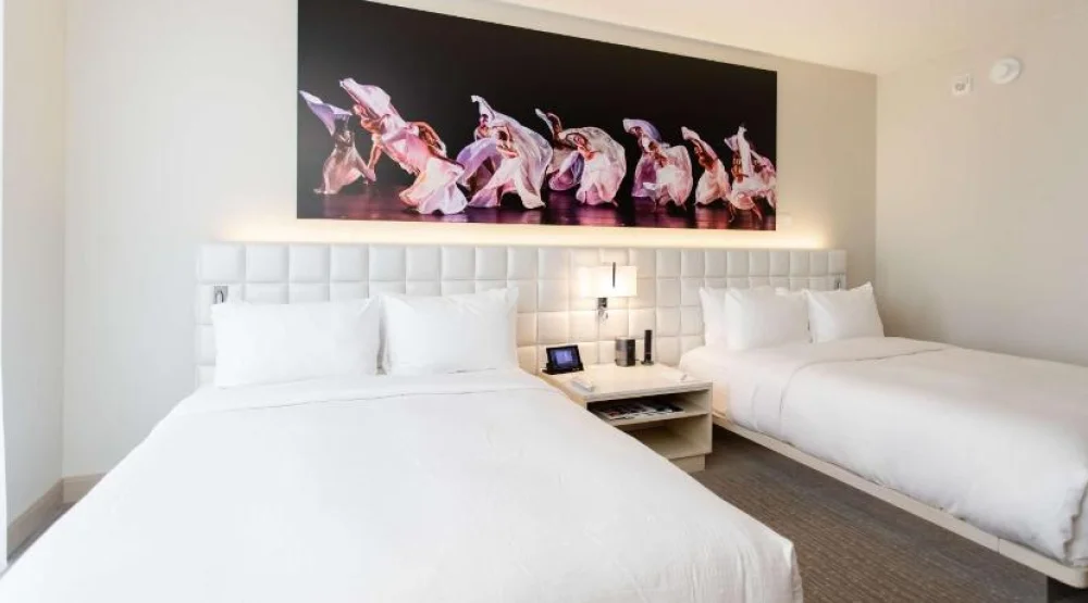Two Queen Beds Guest Room at HALL Arts Hotel Dallas Curio Collection by Hilton