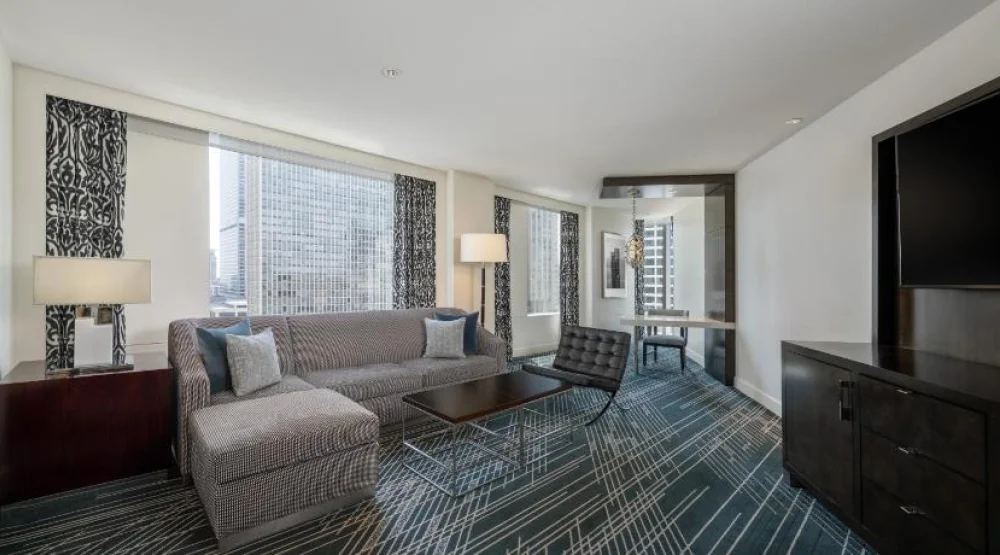 King Corner Suite with Sofabed  and Living Room at Sofitel Chicago Magnificent Mile
