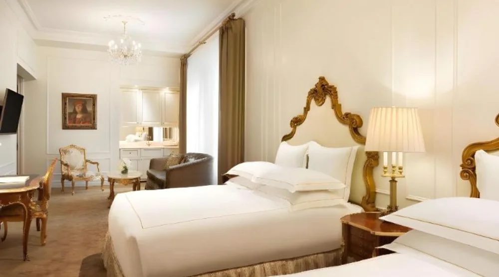 Family Grand Luxe Two Queens, 730sf- 67sm, Pullou T Sofa Available at The Plaza New York