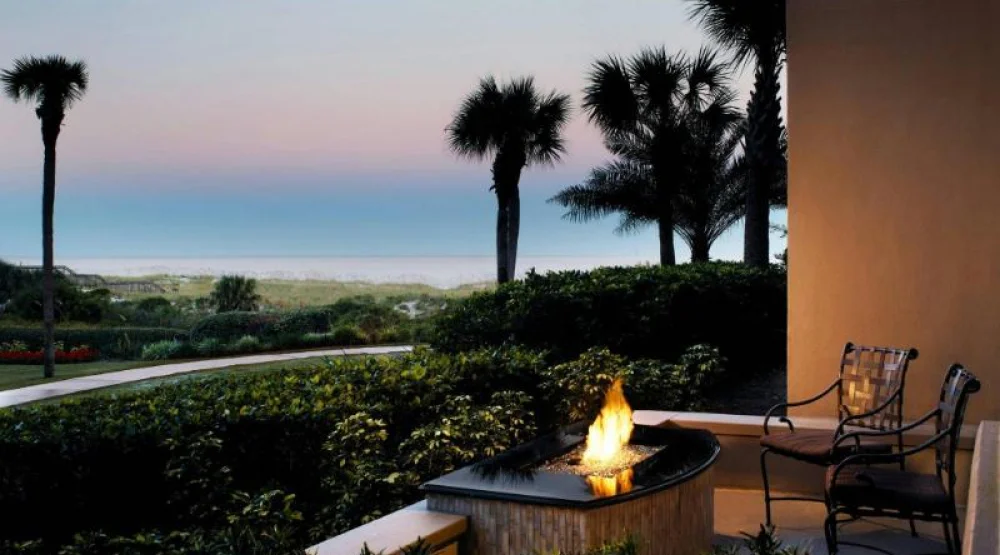 Fire Table Terrace Queens, Guest Room, Two Queen, Ground Floor, Fireplace at The Ritz-Carlton Amelia Island