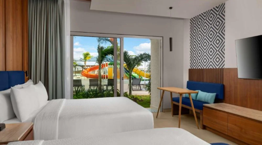 Pool Patio Two Queen Bed Room at Hilton Cancun Mar Caribe All-Inclusive Resort