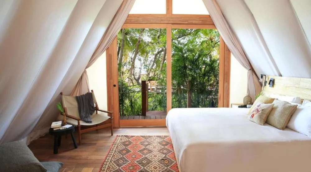 Lagoon Breeze Room at Our Habitas Bacalar