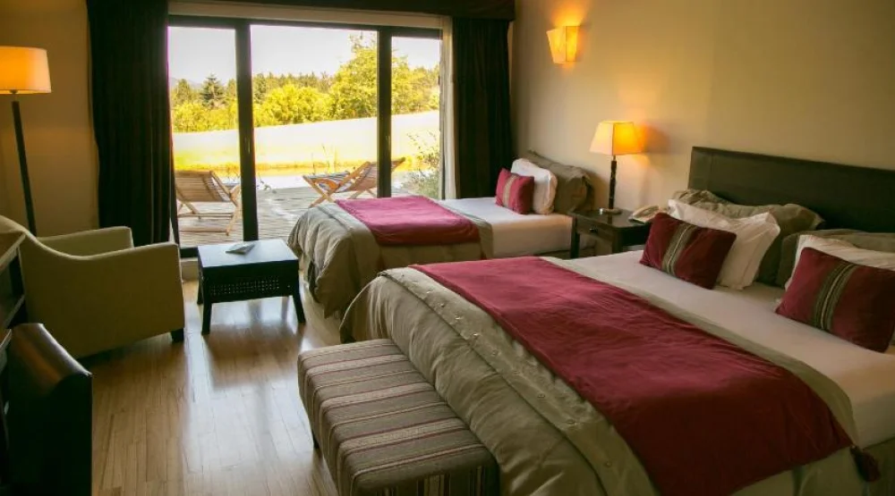 Superior Triple Room at Loi Suites Chapelco Hotel