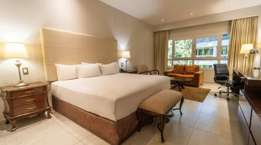 Club Executive King, Club Lounge Access, Guest Room, One King, Garden View, Balcony at Los Tajibos a Tribute Portfolio Hotel