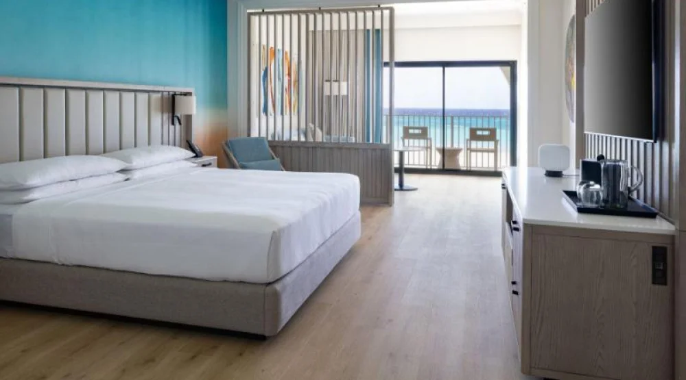 Junior Suite King, Junior Suite, One King, Sofa Bed, Oceanfront, Balcony at Grand Cayman Marriott Resort