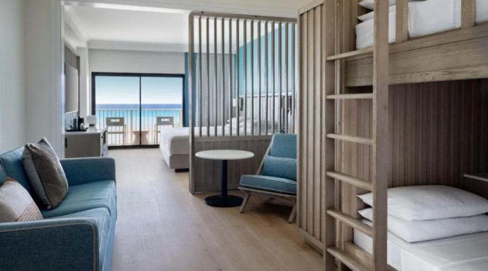 Family Suite-bunk Beds, Suite, One King, Sofa Bed, Oceanfront, Balcony at Grand Cayman Marriott Resort