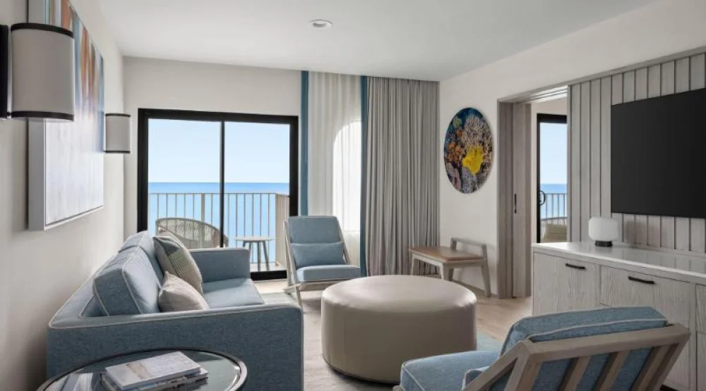 Ocean Suite, One Bedroom Suite, One King, Sofa Bed, Oceanfront, Balcony at Grand Cayman Marriott Resort