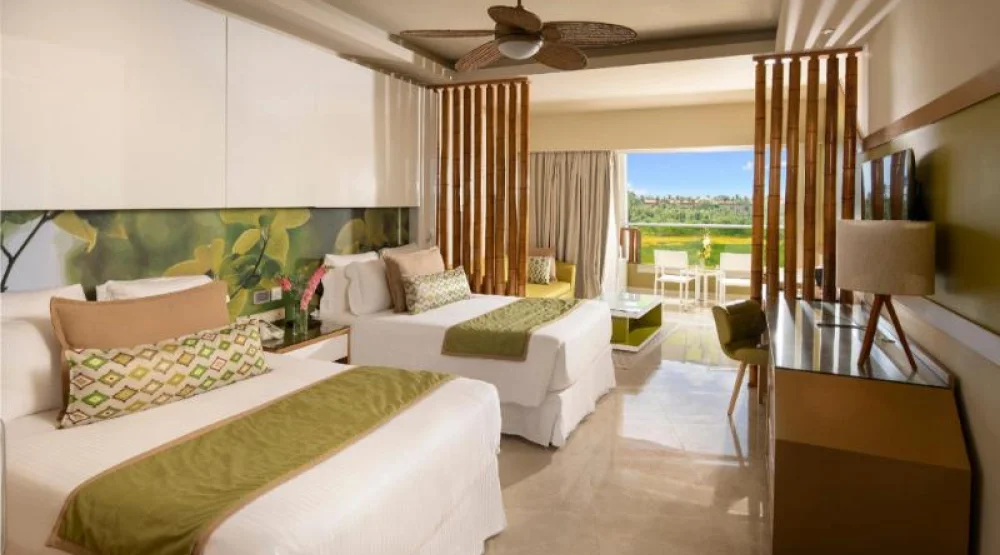 Preferred Club Junior Suite Partial Ocean View Double Beds at Dreams Onyx Resort & Spa