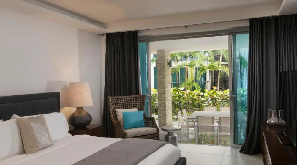 One Bedroom Suite, One King, Garden View, Terrace at The Ocean Club a Luxury Collection Resort Costa Norte
