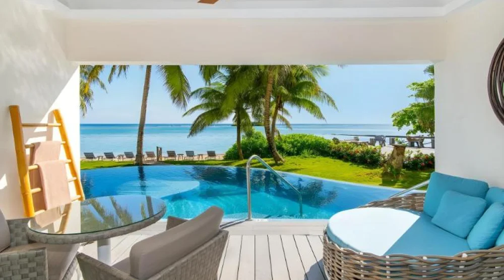 Junior Suite Swim Out Ocean View with Soaking Tub at Zoetry Montego Bay
