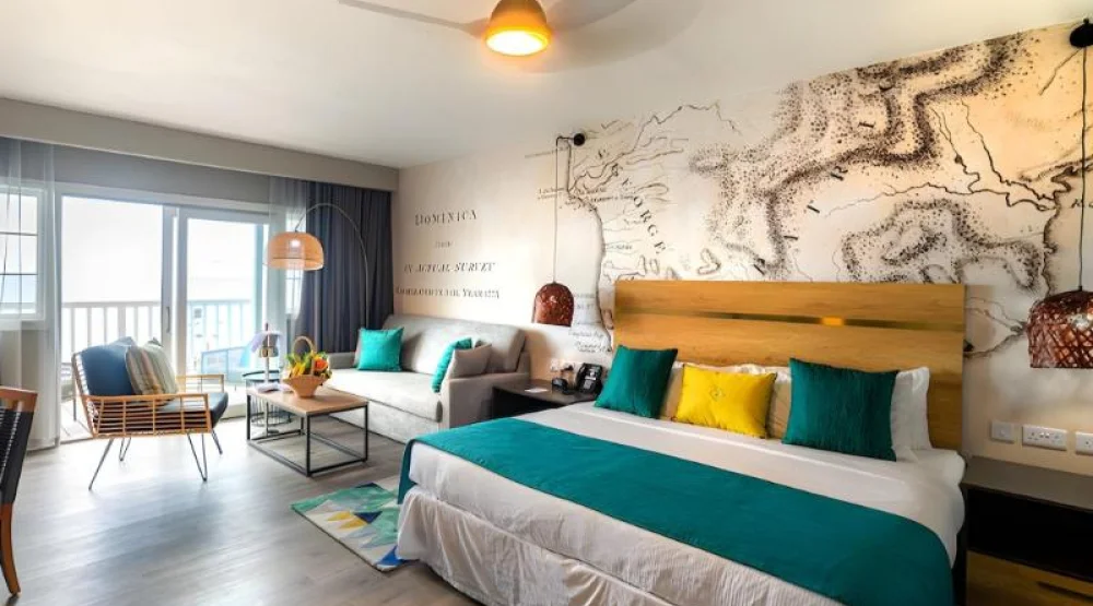 Deluxe Oceanfront Room at Fort Young Hotel & Dive Resort