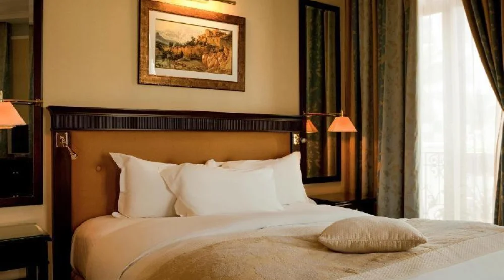 Classic Queen Bed at Royal Hotel Oran