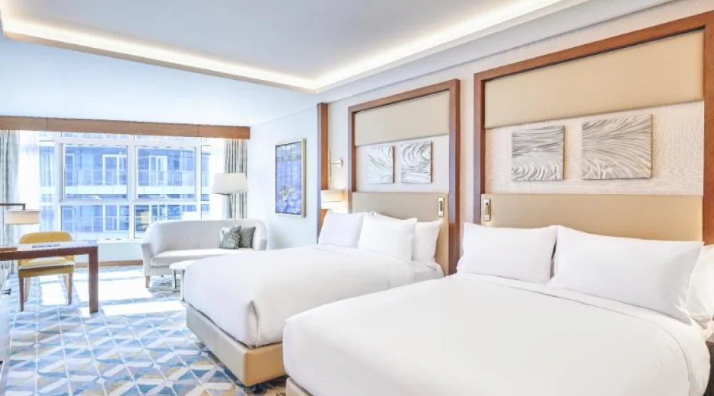 Two Queen Beds Premium Room Partial Nile View at Hilton Cairo Nile Maadi