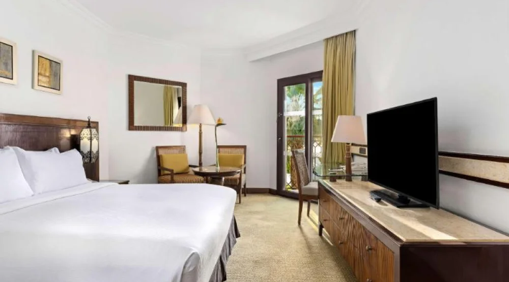 Guest Room Partial Nile / King Bed at Hilton Luxor Resort & Spa