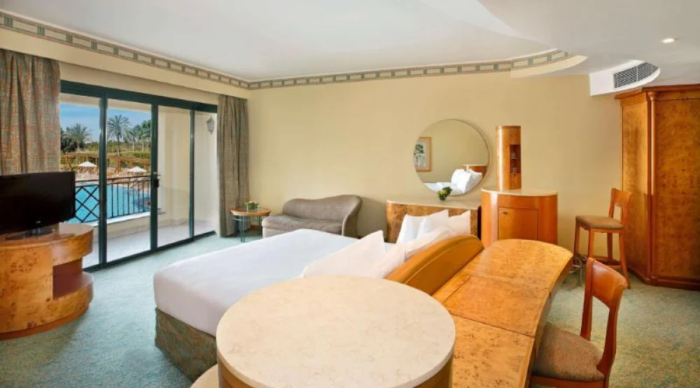 King Deluxe Room Pool View at Hilton Pyramids Golf