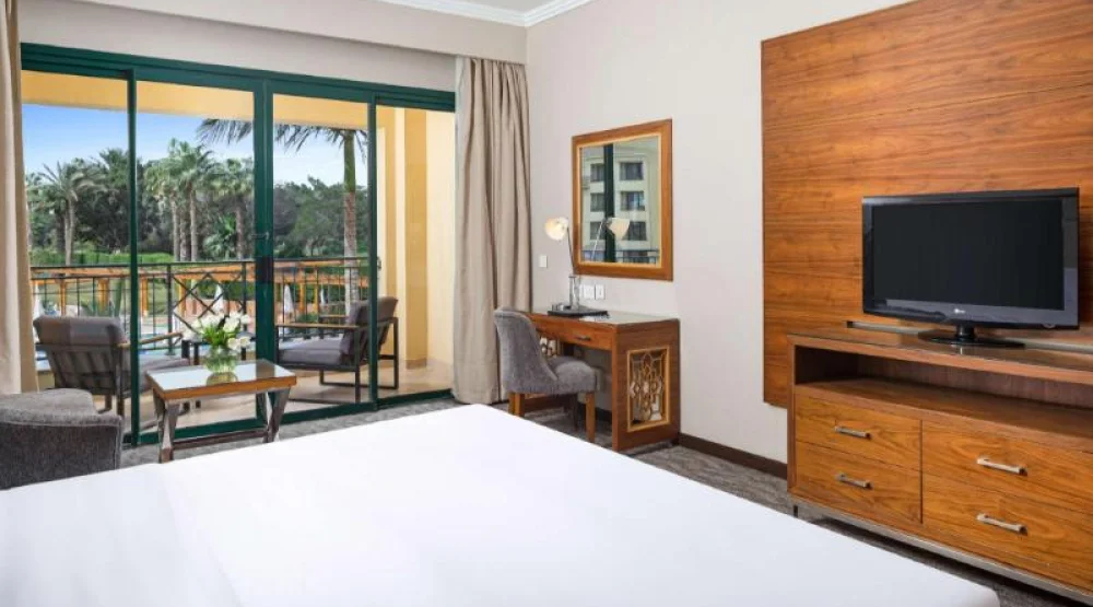 King Superior Room Pool at Hilton Pyramids Golf