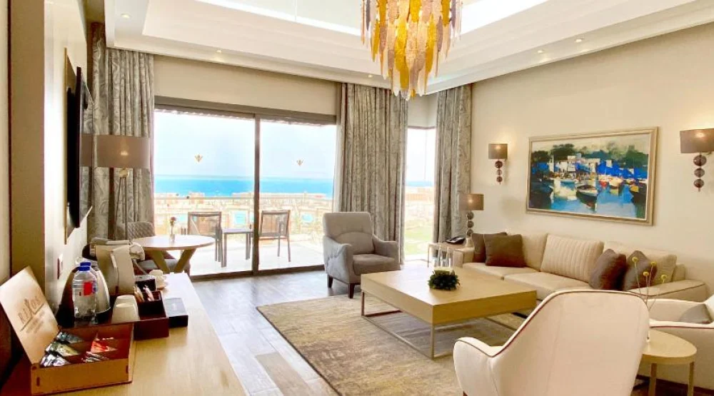 Lagoon Deluxe Suite King Bed Sea View at Rixos Premium Magawish Suites & Villas