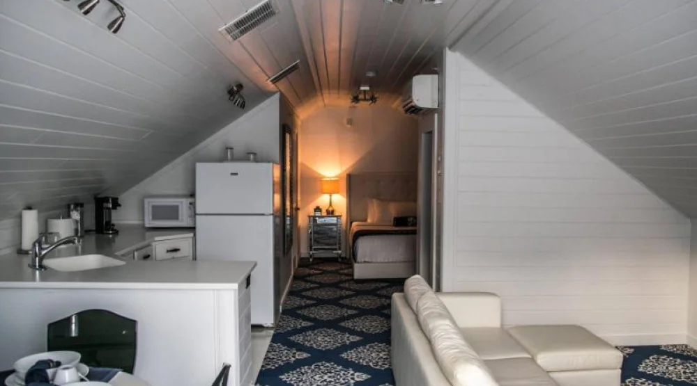 Loft, Larger Guest Room, in Loft: One King, Limited View at The Saint Hotel Key West Autograph Collection