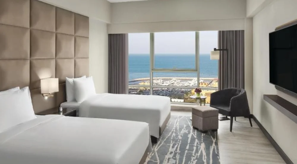 Two Bedroom Suite with One King Bed and Two Twin Beds High Floor at Hyatt Regency Al Kout Mall