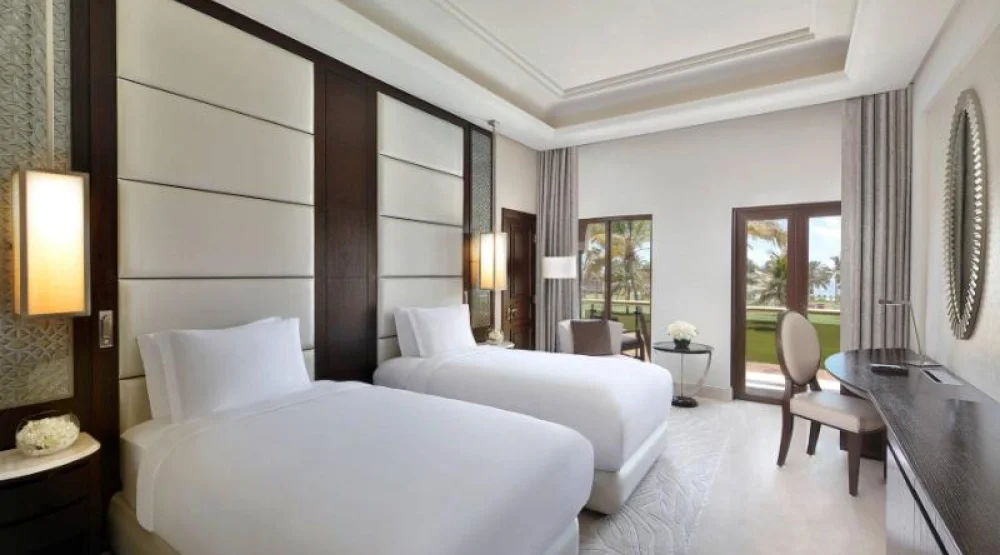 Deluxe Guest Room, Two Twin, Garden View, Mid Floor, Balcony at Al Bustan Palace a Ritz-Carlton Hotel