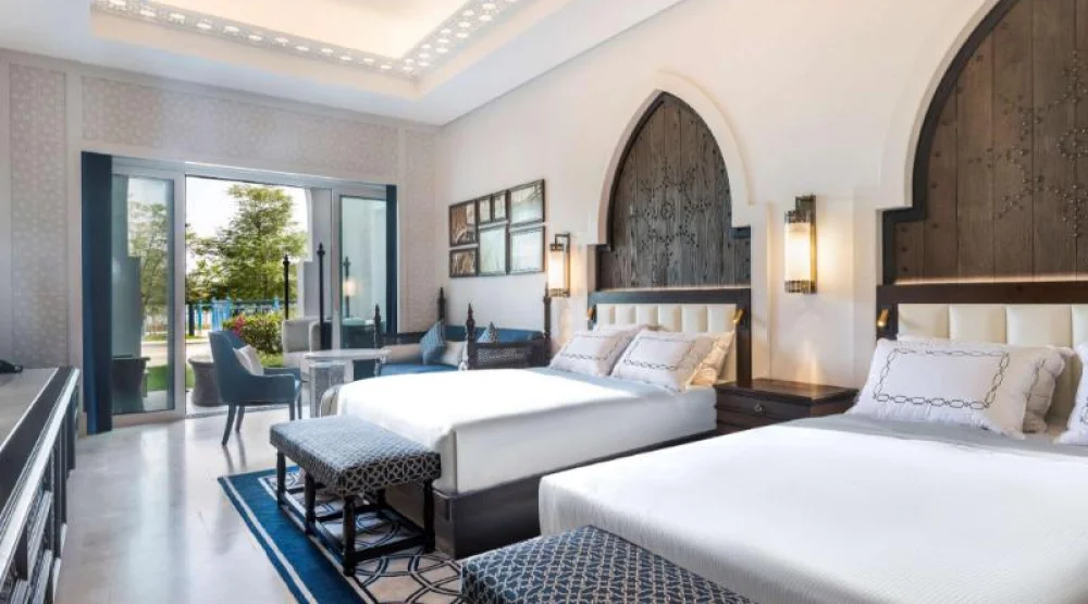 Two Queen Beds Guest Room with Sea View at Hilton Salwa Beach Resort & Villas