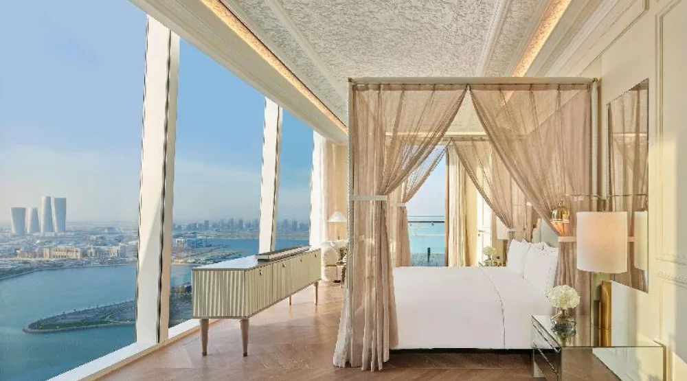 Parisian Suite with One Double and Two Twin Beds at Raffles Doha