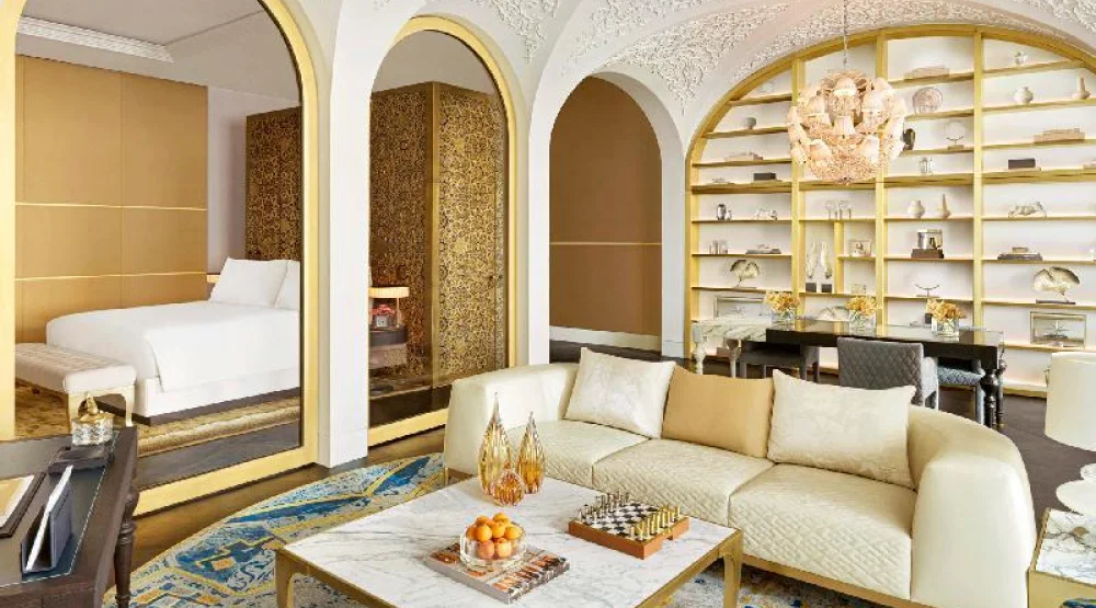 Designer Suite with One Double and Two Twin Beds at Raffles Doha