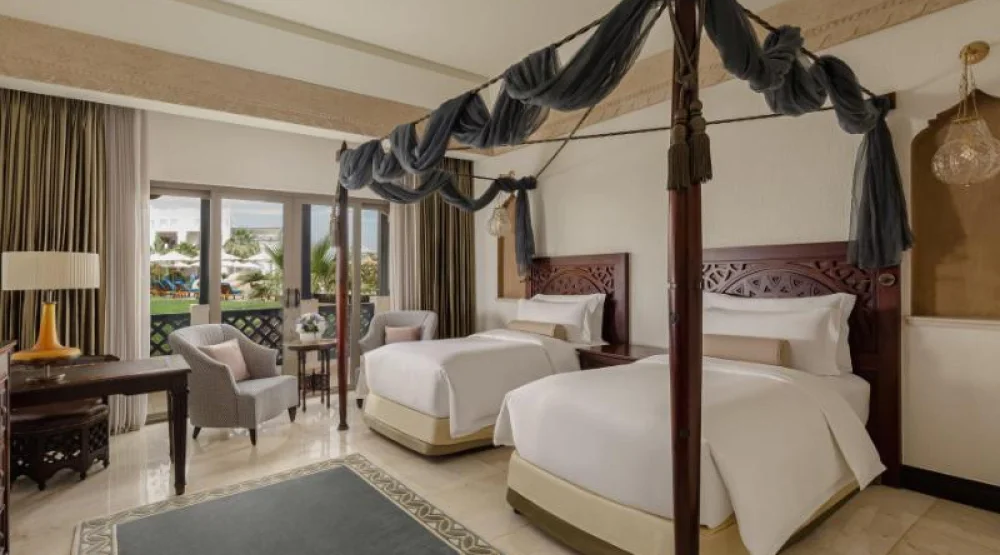 Deluxe Guest Room, Two Twin, Pool View at Sharq Village & Spa a Ritz-Carlton Hotel
