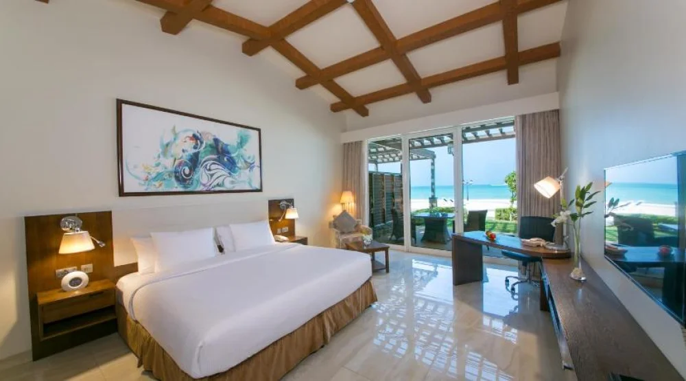 Premium Beachfront Chalet King Room with Garden Private Terrace and Parking at Danat Jebel Dhanna Resort