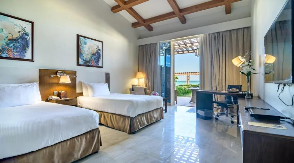 Premium Beachfront Chalet Double Room with Two Beds with Garden, Private Terrace and Parking at Danat Jebel Dhanna Resort