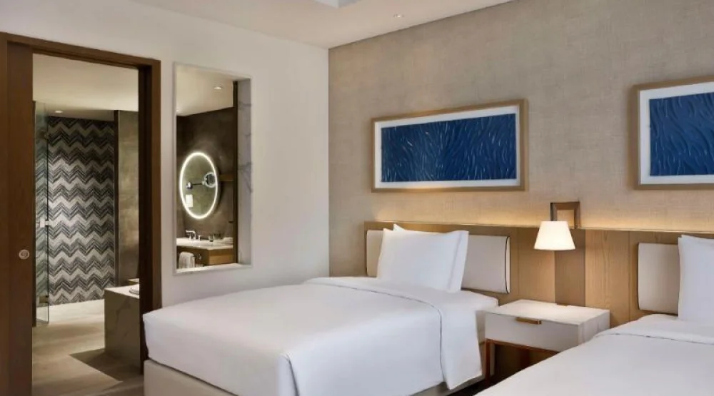 Two Double Beds Deluxe Room with Pool View at Hilton Abu Dhabi Yas Island