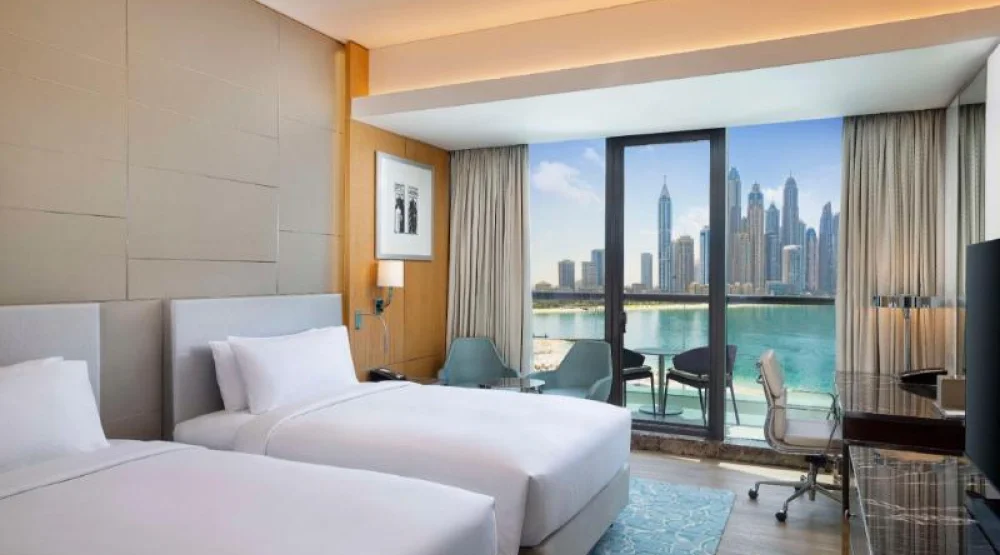Two Double Beds Deluxe Room Sea View Balcony at Hilton Dubai Palm Jumeirah