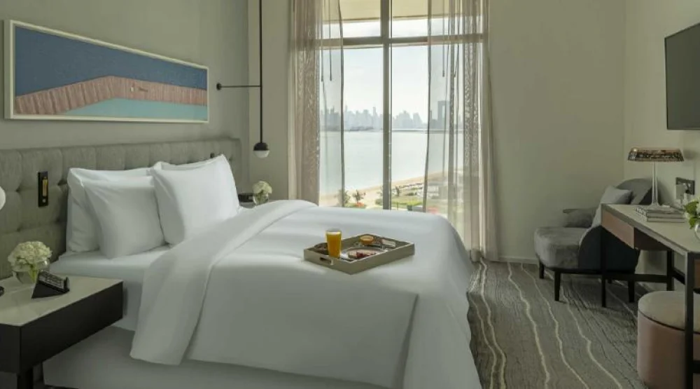 One Bedroom Suite Dining Kitchen Balcony Palm Sea View at Th8 Palm Dubai Beach Resort Vignette Collection