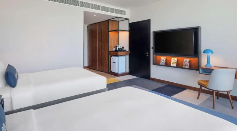 Two Double Beds Artist Room with Pool View at The WB Abu Dhabi Curio Collection By Hilton