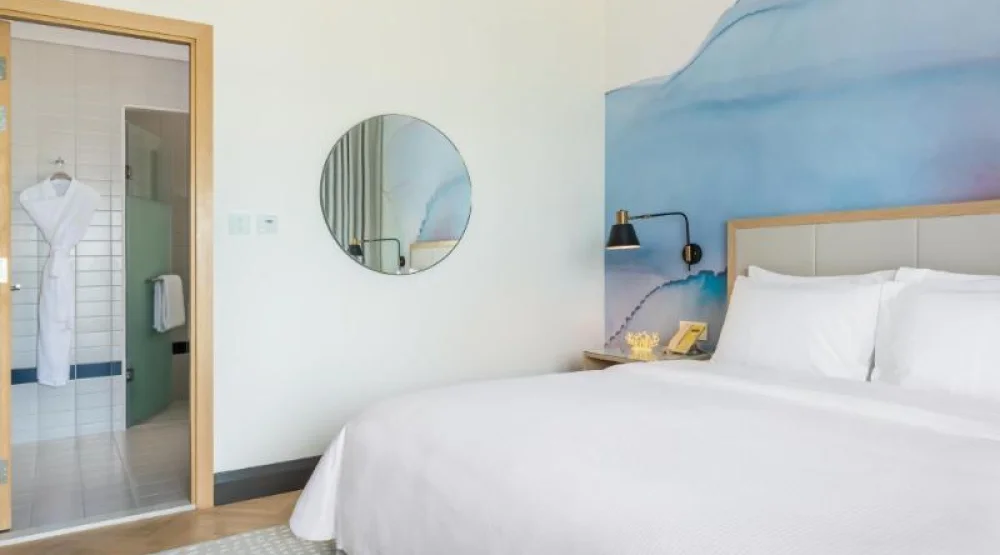 Deluxe Partial Sea View King Room at Vida Beach Resort