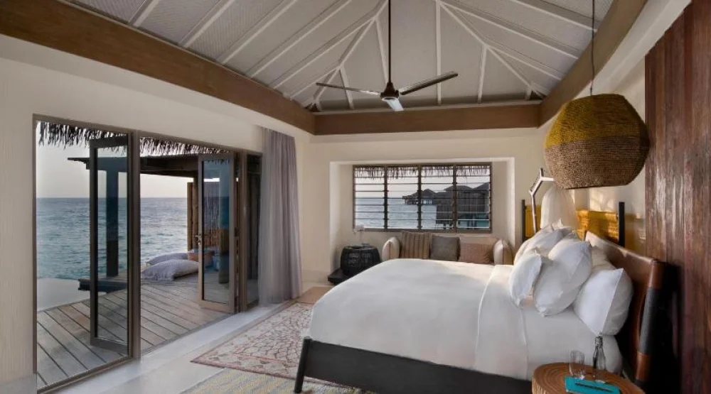 Sunset Overwater Pool at InterContinental Maldives Maamunagau Resort