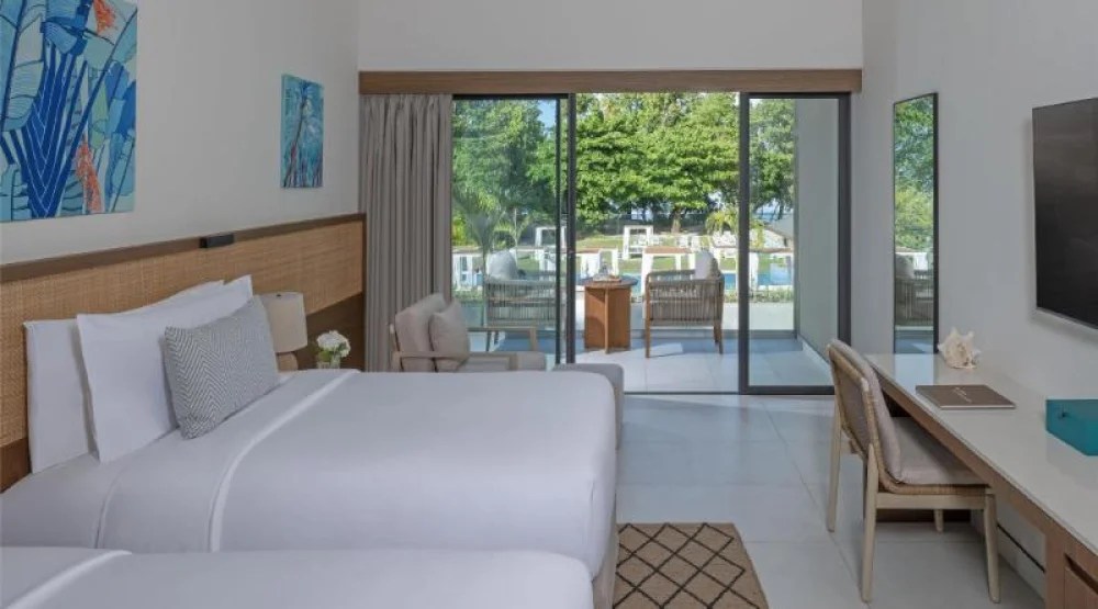 Premium Beach View Balcony Room at Avani Barbarons Seychelles Resort & Spa