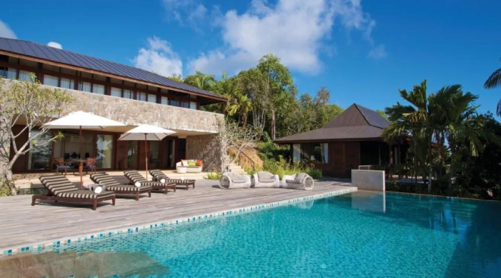 Three Bedroom Residence Villa Two King Beds and Two Twin Beds at Four Seasons Resort Seychelles