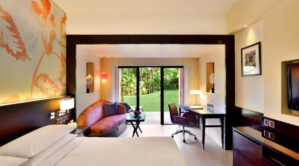 Patio, Guest Room, One King, Garden View at Goa Marriott Resort & Spa