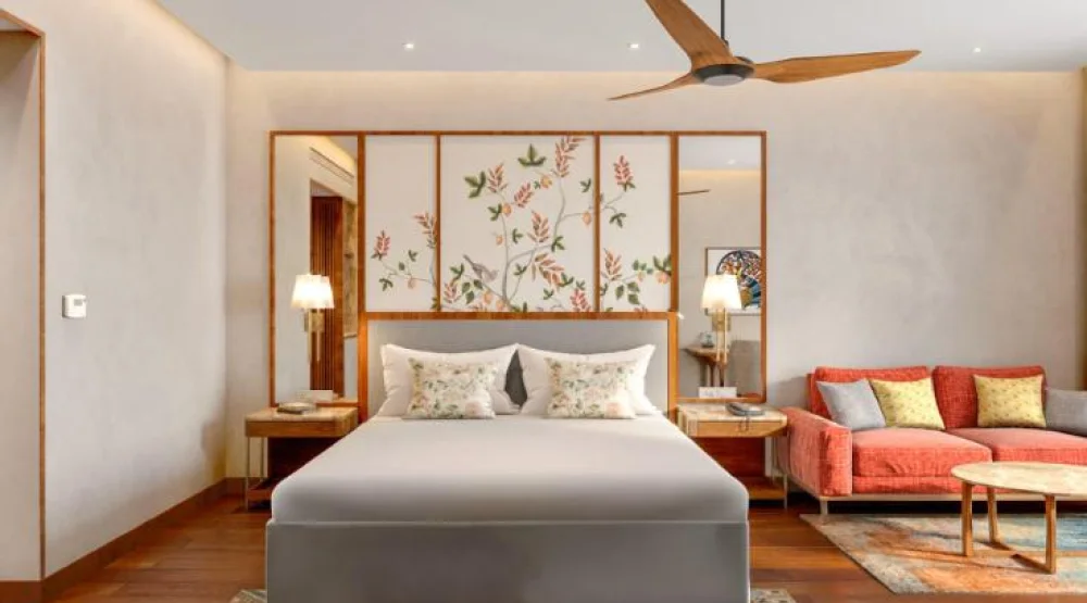 Deluxe Pool View Room with Balcony King Bed at Taj Damdama Lake Resort & Spa Gurugram