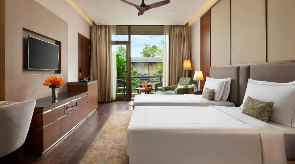 Luxury Room Courtyard View with Balcony  - Twin Bed at Taj Damdama Lake Resort & Spa Gurugram