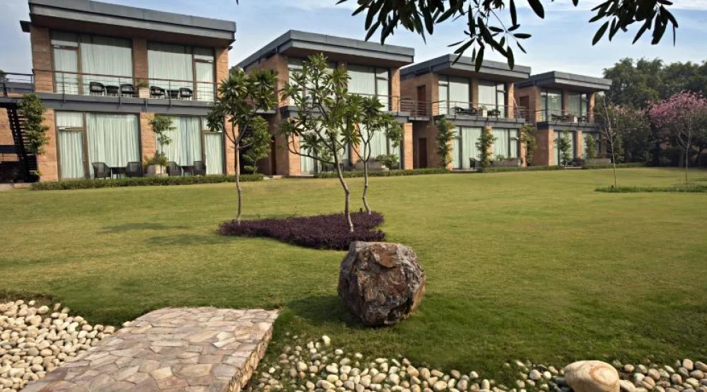 Grand Luxury Room with Sit Out - King Bed at Taj Damdama Lake Resort & Spa Gurugram