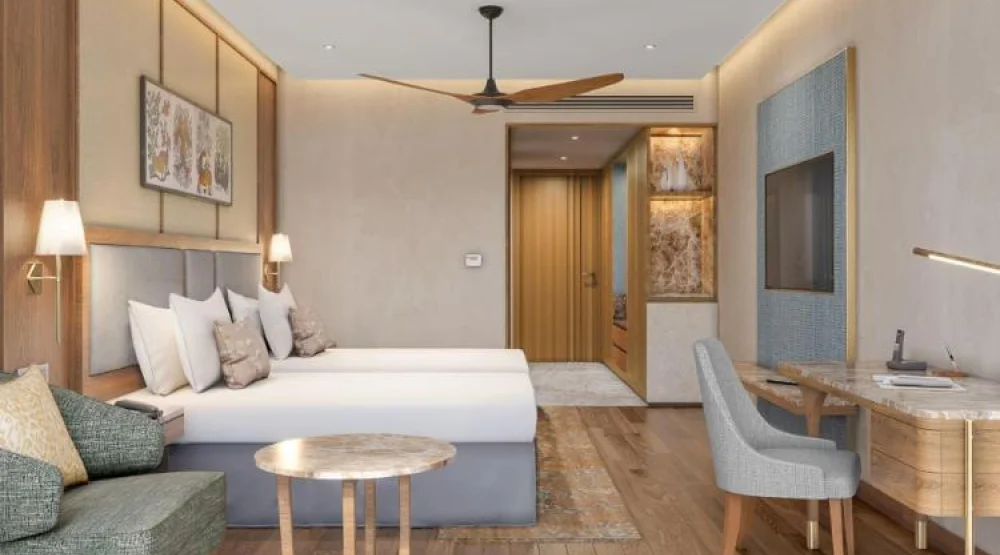 Deluxe Pool View Room with Balcony Twin Bed at Taj Damdama Lake Resort & Spa Gurugram