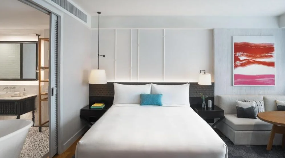One King and Two Twin Family Room at Kimpton Kitalay Samui