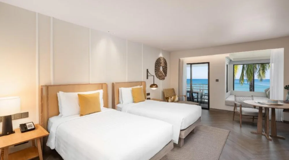 Club Ocean Front Two Twin Beds at SAii Laguna Phuket