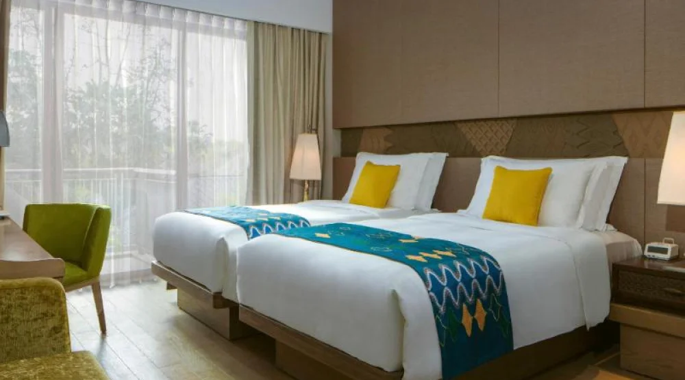 Classic Twin Pool View Room at Movenpick Resort & Spa Jimbaran Bali