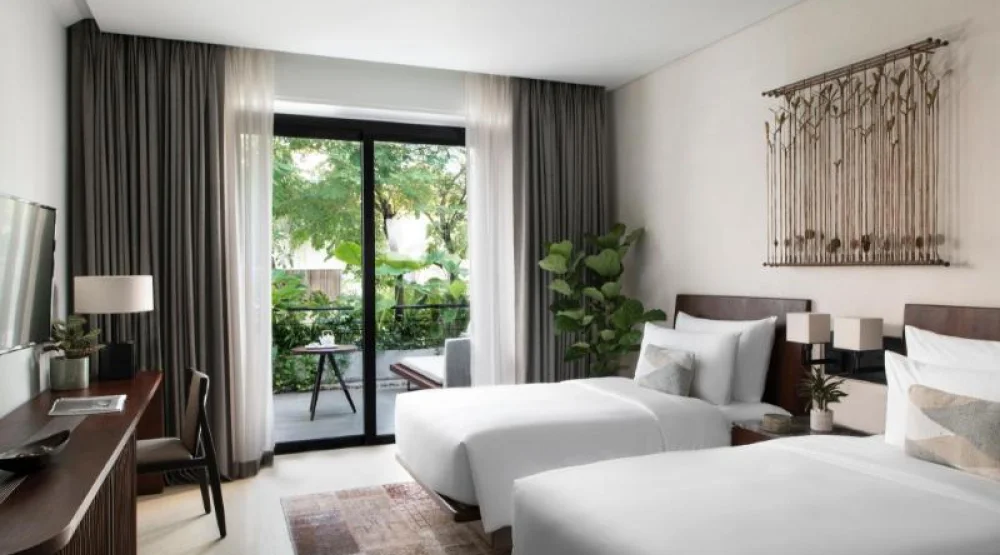 Deluxe Living Twin Room at Treeline Urban Resort