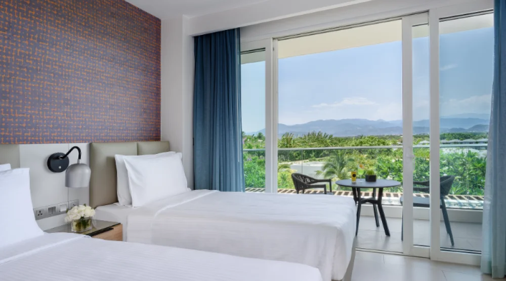 Two Bedroom Suite Pavilion, with Terrace, Ocean View - One King & One Twin at Alma Resort Cam Ranh